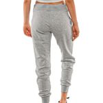 PANTALON-MUJER-NEW-BALANCE-ESSENTIALS-FT--SWEAT
