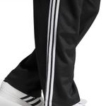PANTALON-HOMBRE-ADIDAS-FIREBIRD-BAGGY